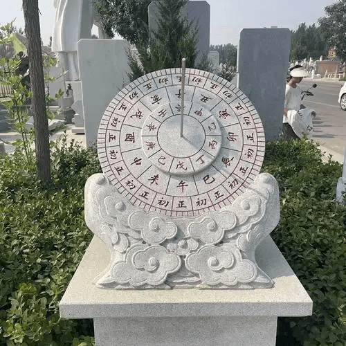A modern sundial showing the dial plate and gnomon